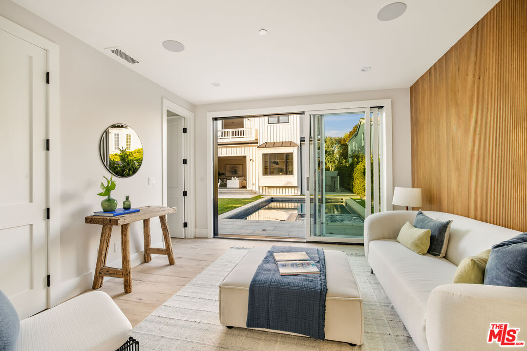 628 10th Street Santa Monica, CA 90402 - Photo 35 of 48 a living room with furniture and a large window