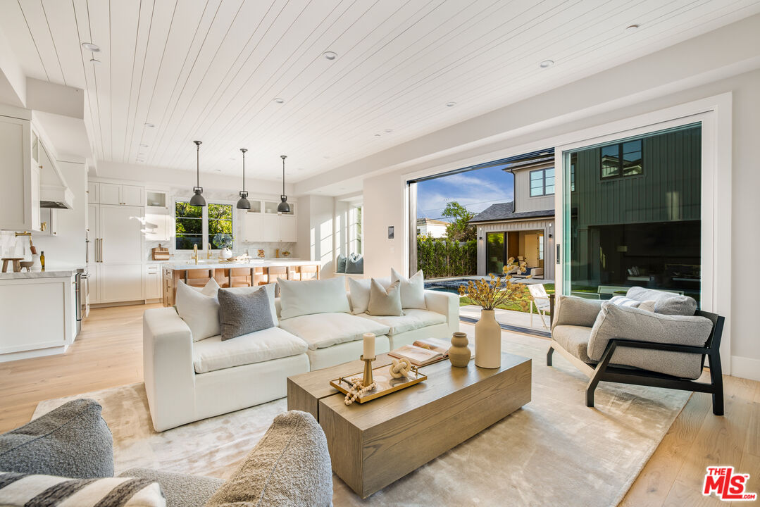 628 10th Street Santa Monica, CA 90402 - Photo 10 of 48 a living room with furniture and a large window