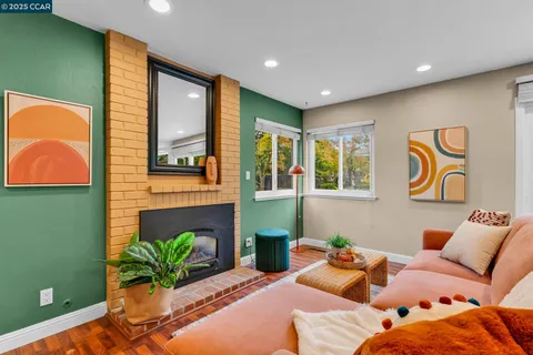 a bedroom with furniture and a potted plant