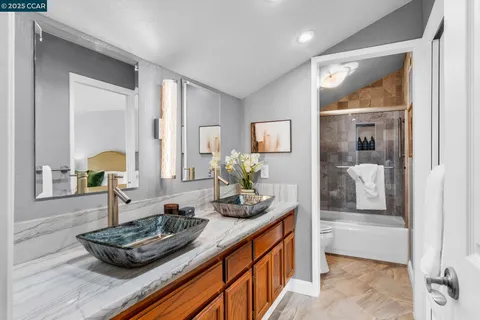 a room with furniture and a mirror