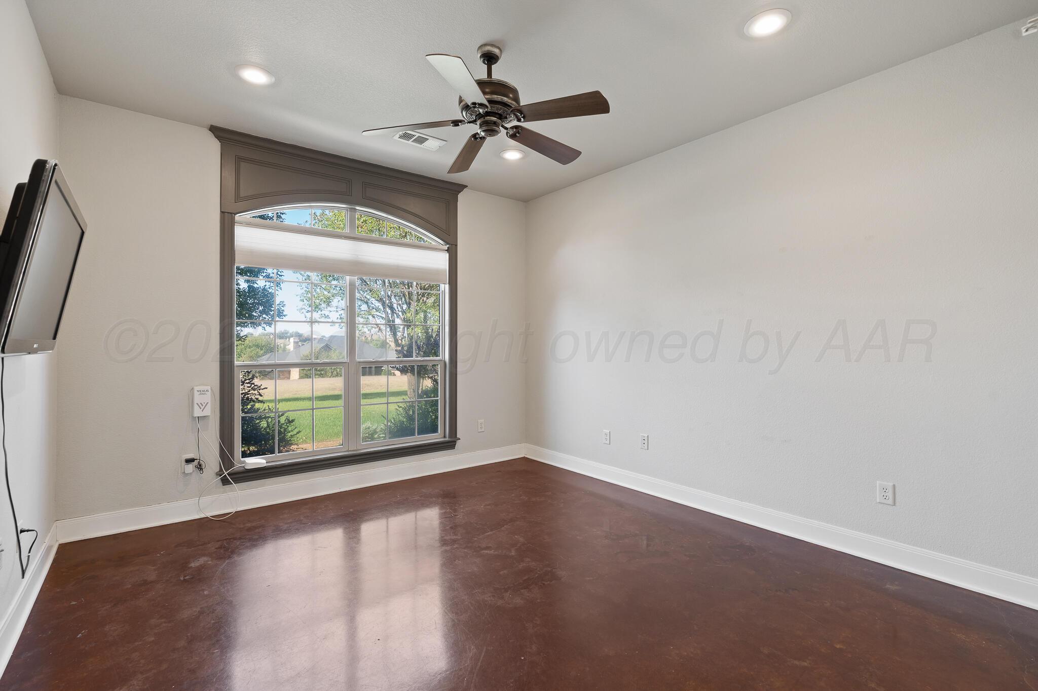 17301 Spring Lake Drive Canyon, TX 79015 - Photo 11 of 62 an empty room with a window