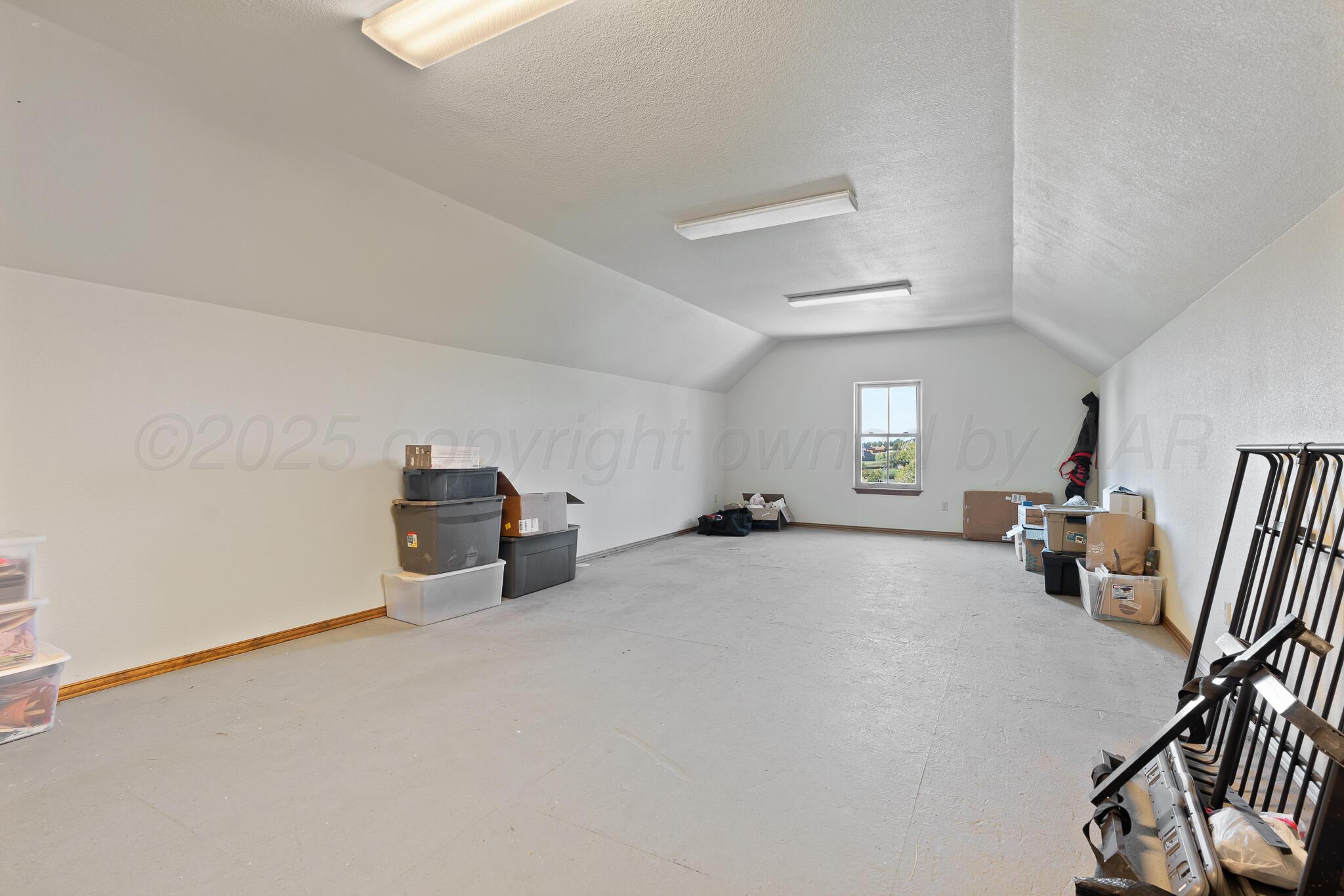 17301 Spring Lake Drive Canyon, TX 79015 - Photo 37 of 62 a room with furniture and a table