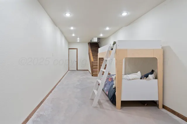 a view of house and car parked in front of house
