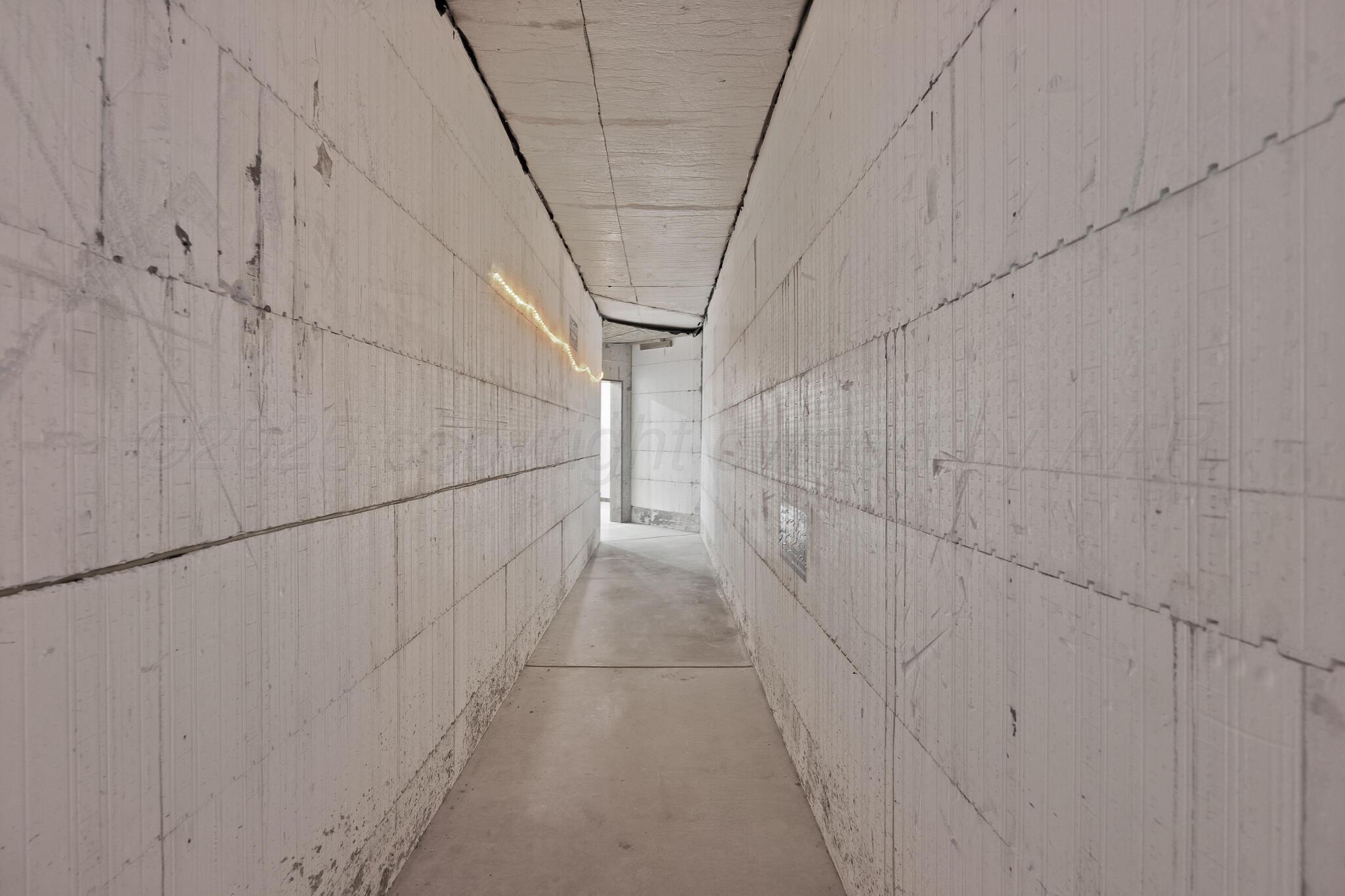 17301 Spring Lake Drive Canyon, TX 79015 - Photo 40 of 62 a view of a pathway with white walls