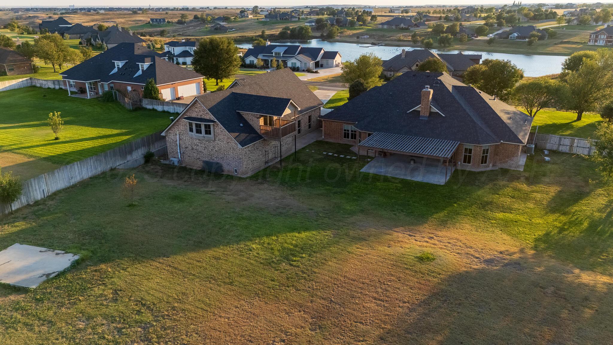 17301 Spring Lake Drive Canyon, TX 79015 - Photo 42 of 62 an aerial view of a house with a ocean view