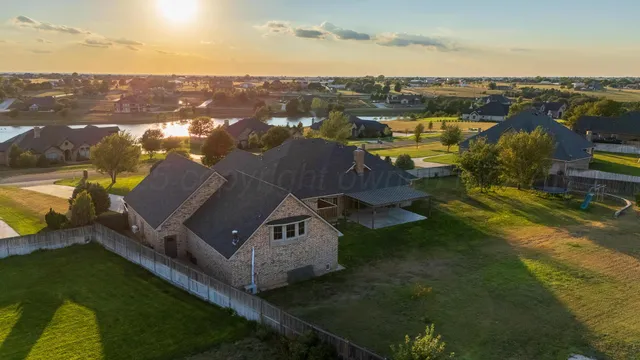 an aerial view of residential house with outdoor space