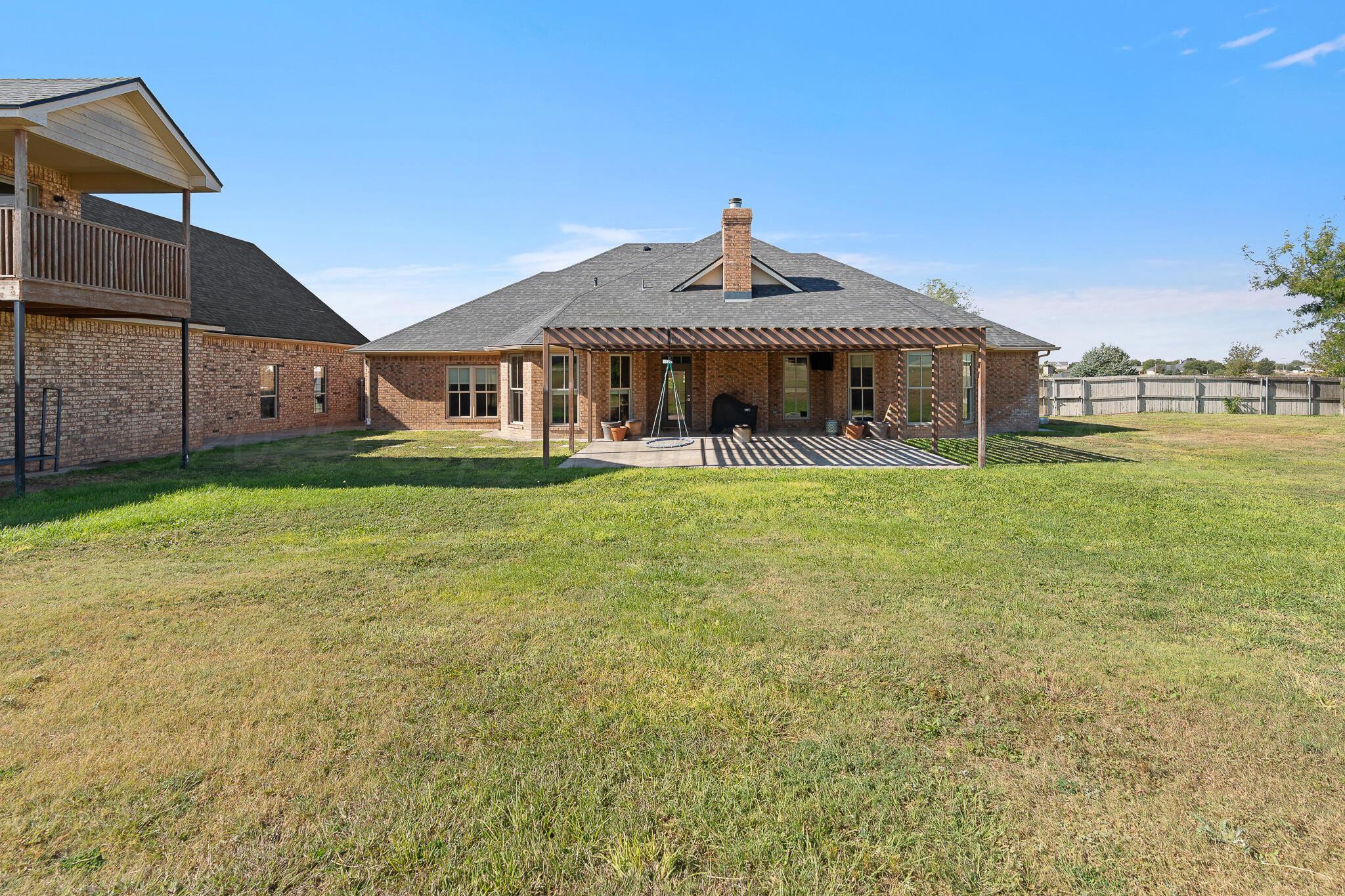 17301 Spring Lake Drive Canyon, TX 79015 - Photo 44 of 62 a view of a house with a yard and sitting area