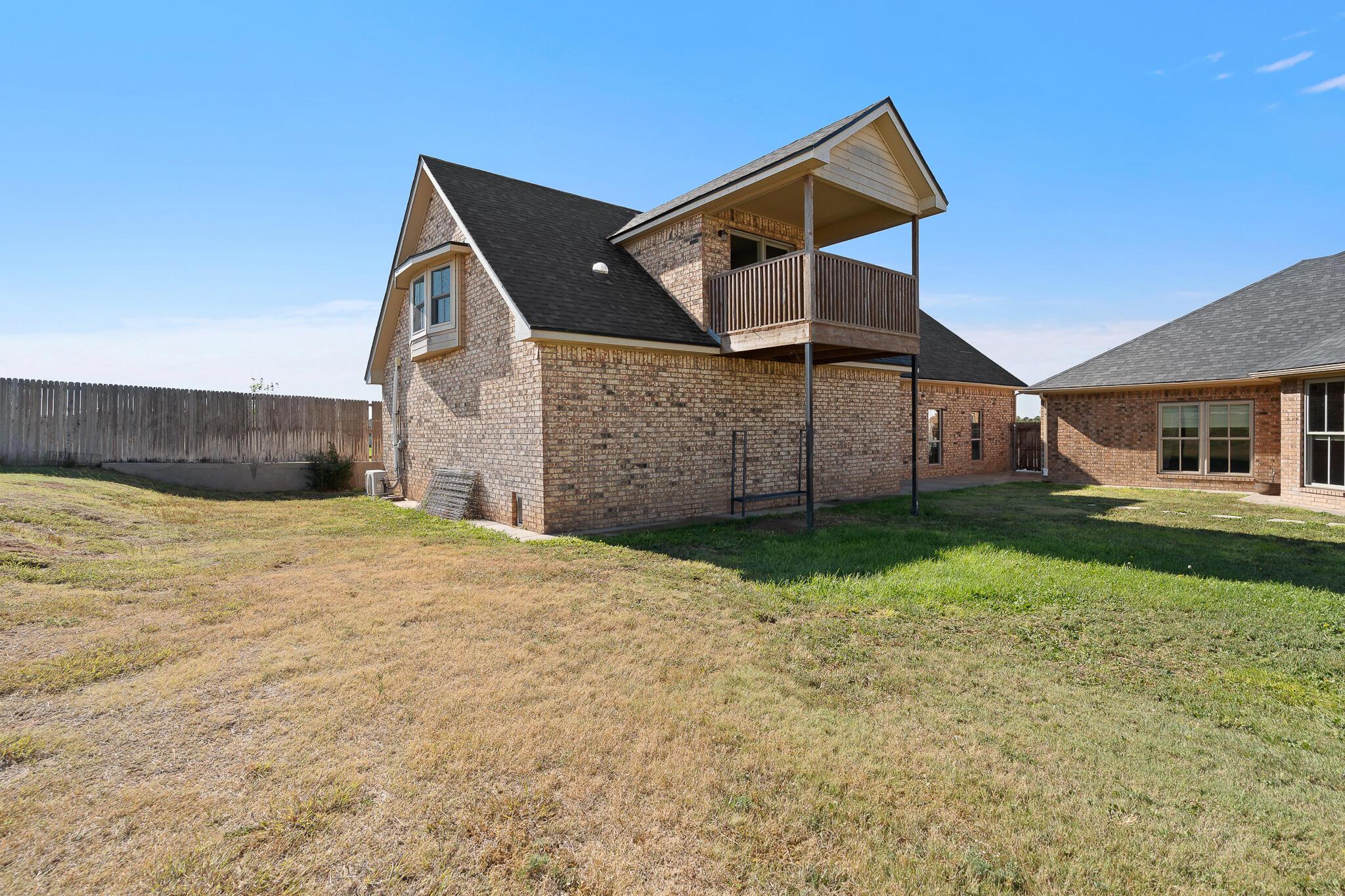 17301 Spring Lake Drive Canyon, TX 79015 - Photo 45 of 62 a front view of a house with a yard