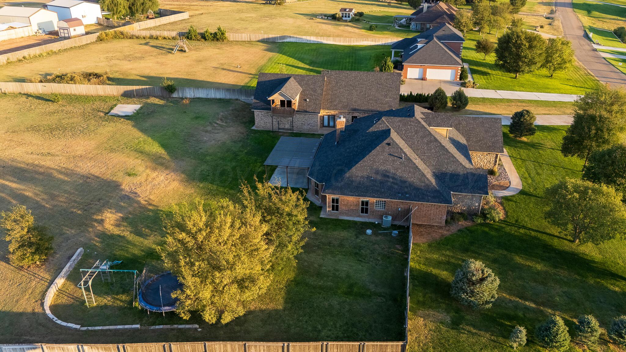 17301 Spring Lake Drive Canyon, TX 79015 - Photo 55 of 62 an aerial view of residential house with outdoor space