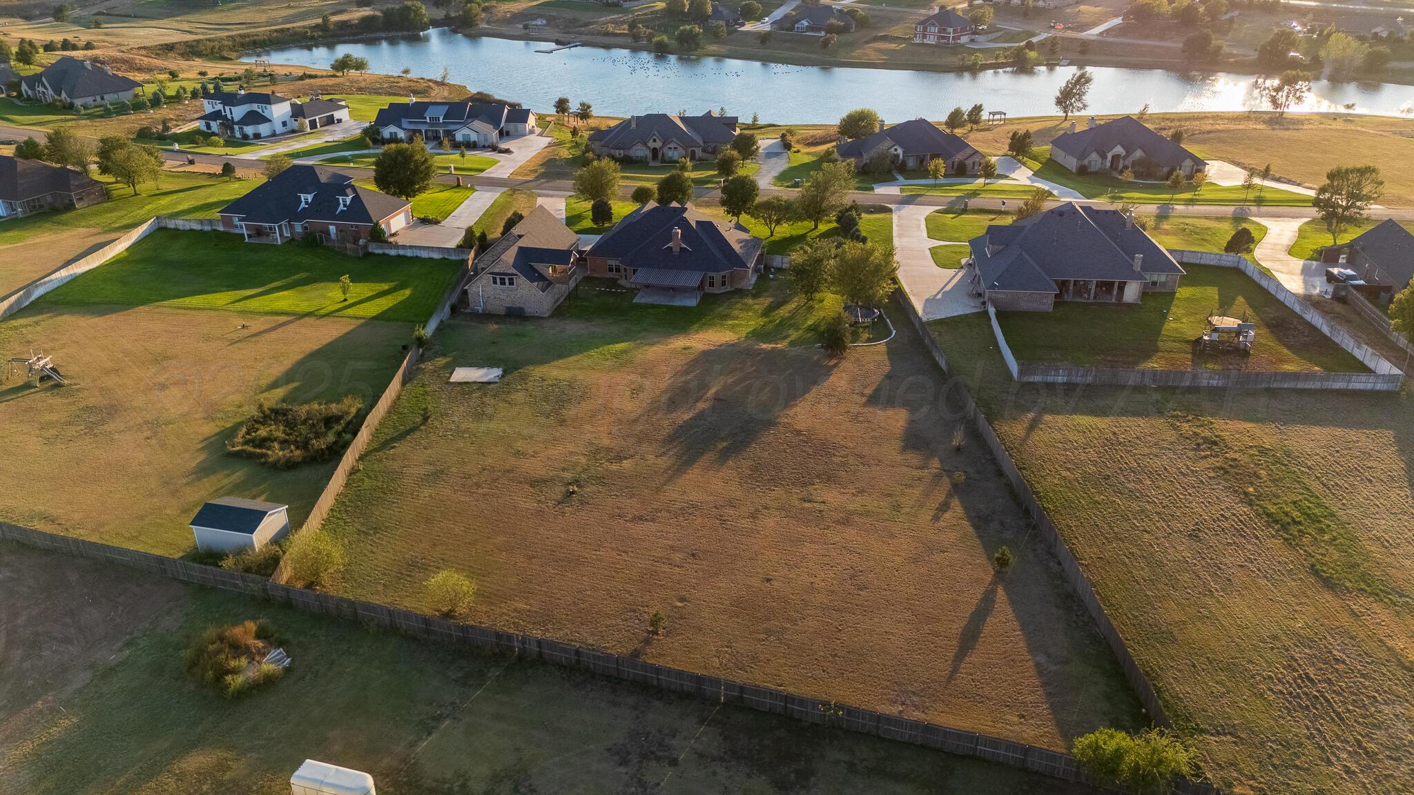 17301 Spring Lake Drive Canyon, TX 79015 - Photo 56 of 62 an aerial view of a house with a ocean view