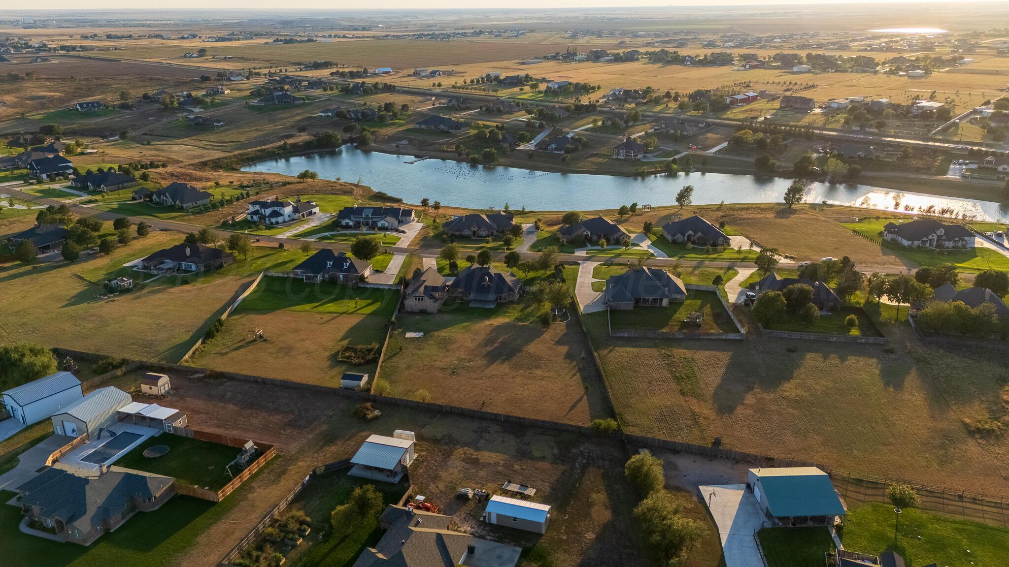 17301 Spring Lake Drive Canyon, TX 79015 - Photo 57 of 62 an aerial view of residential houses with outdoor space