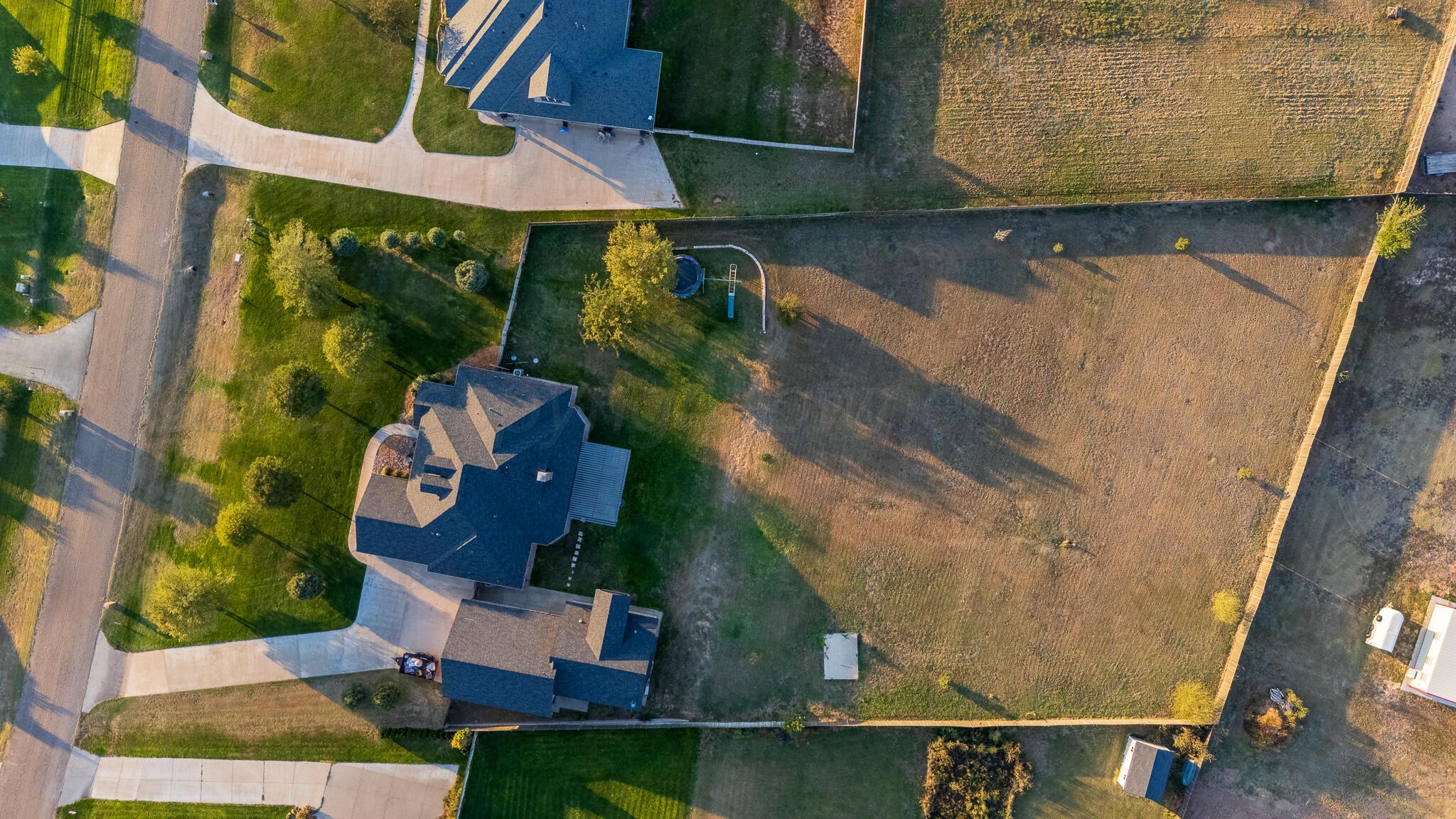 17301 Spring Lake Drive Canyon, TX 79015 - Photo 58 of 62 an aerial view of residential house with outdoor space and parking