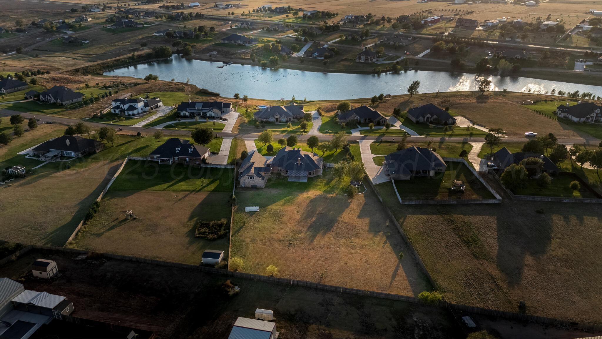17301 Spring Lake Drive Canyon, TX 79015 - Photo 59 of 62 an aerial view of residential houses with outdoor space