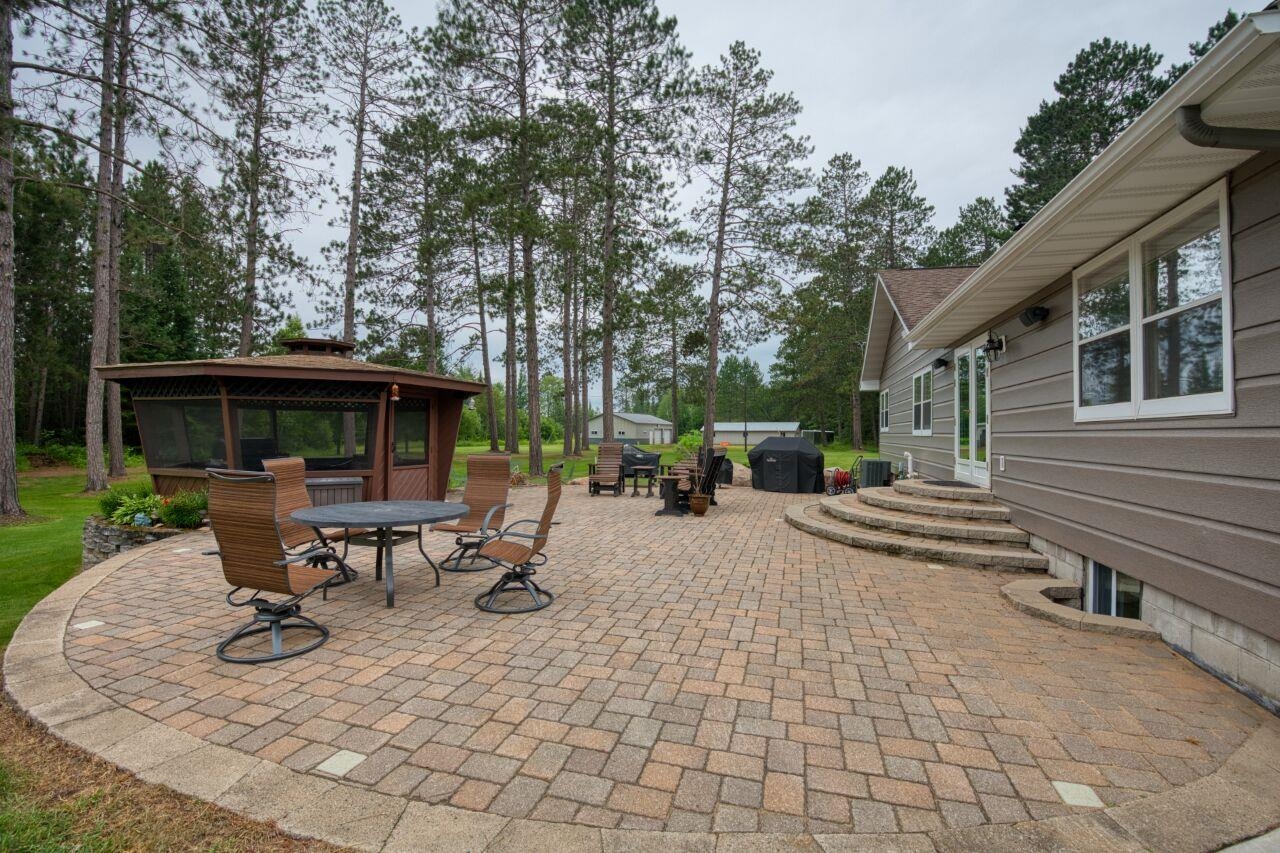 3557 Haverkamp Road Hibbing, MN 55746 - Photo 1 of 60 View of patio / terrace featuring a gazebo and outdoor dining area
