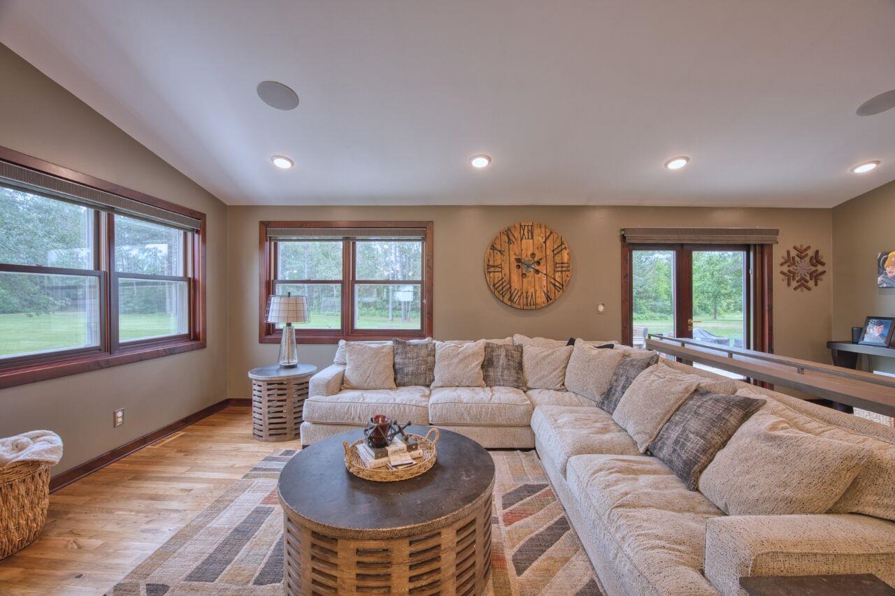 3557 Haverkamp Road Hibbing, MN 55746 - Photo 15 of 60 Living room with light wood finished floors, recessed lighting, and vaulted ceiling
