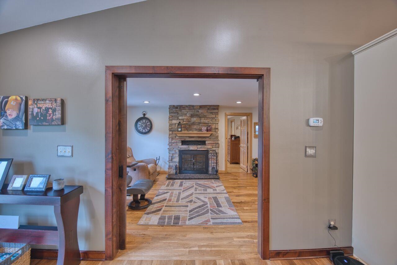 3557 Haverkamp Road Hibbing, MN 55746 - Photo 19 of 60 Corridor featuring light wood-type flooring and baseboards