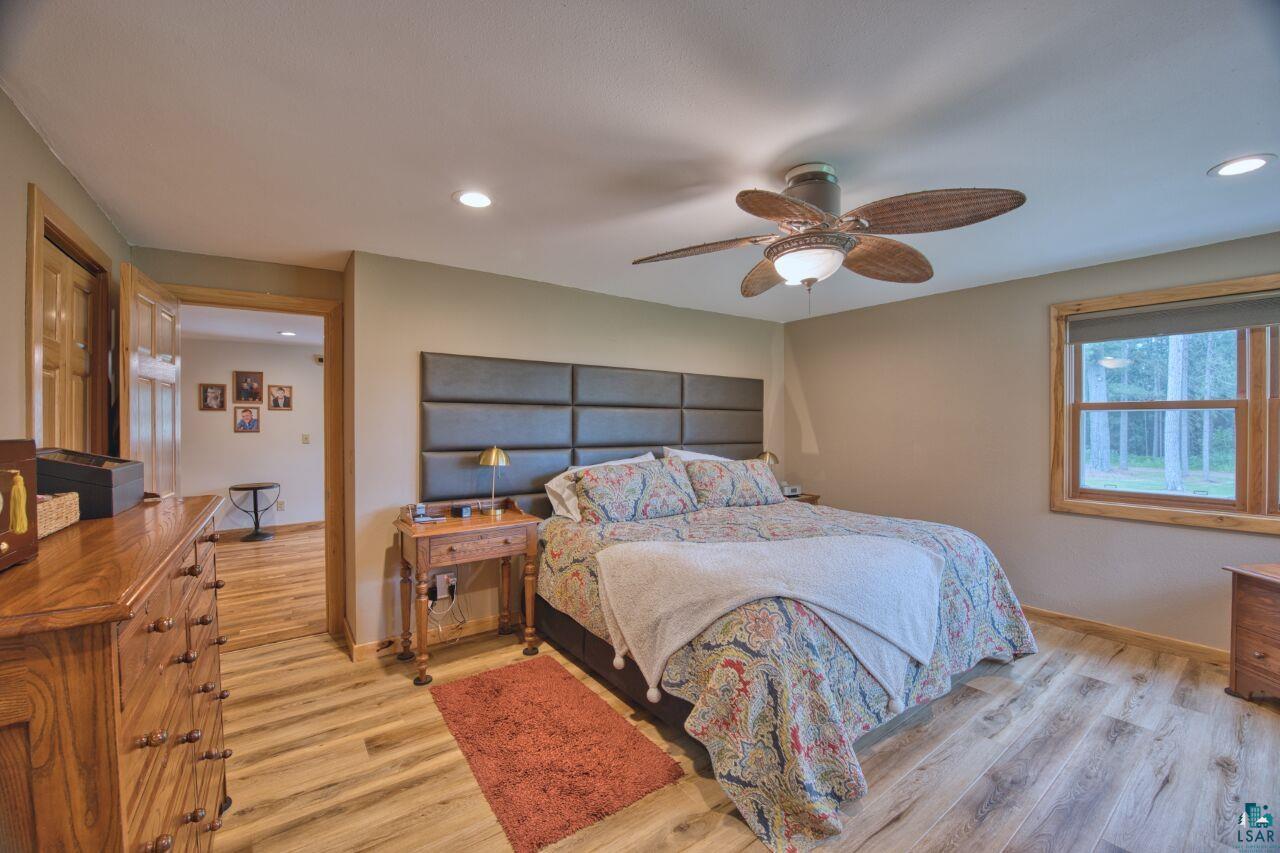 3557 Haverkamp Road Hibbing, MN 55746 - Photo 25 of 60 Bedroom featuring light wood finished floors, recessed lighting, and ceiling fan