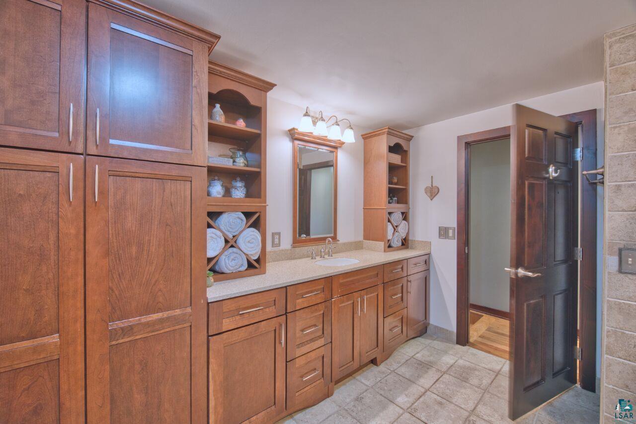3557 Haverkamp Road Hibbing, MN 55746 - Photo 26 of 60 Bathroom with vanity