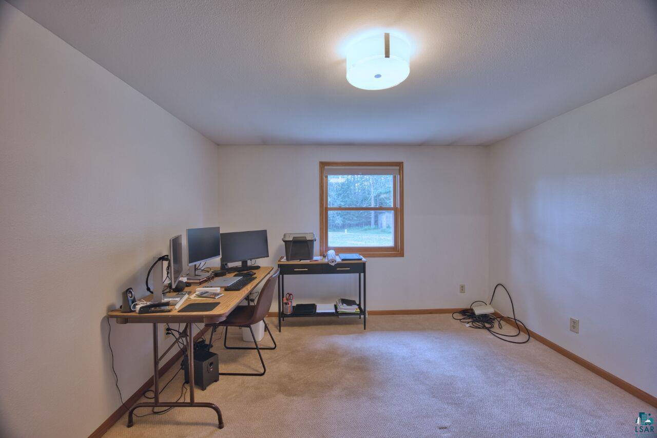 3557 Haverkamp Road Hibbing, MN 55746 - Photo 28 of 60 Carpeted office featuring baseboards
