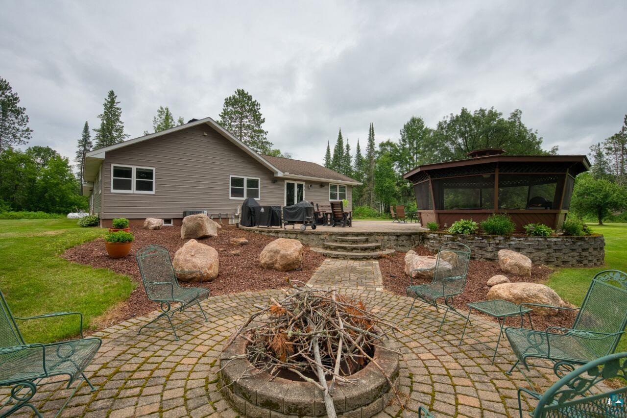 3557 Haverkamp Road Hibbing, MN 55746 - Photo 56 of 60 View of patio featuring a fire pit and a gazebo
