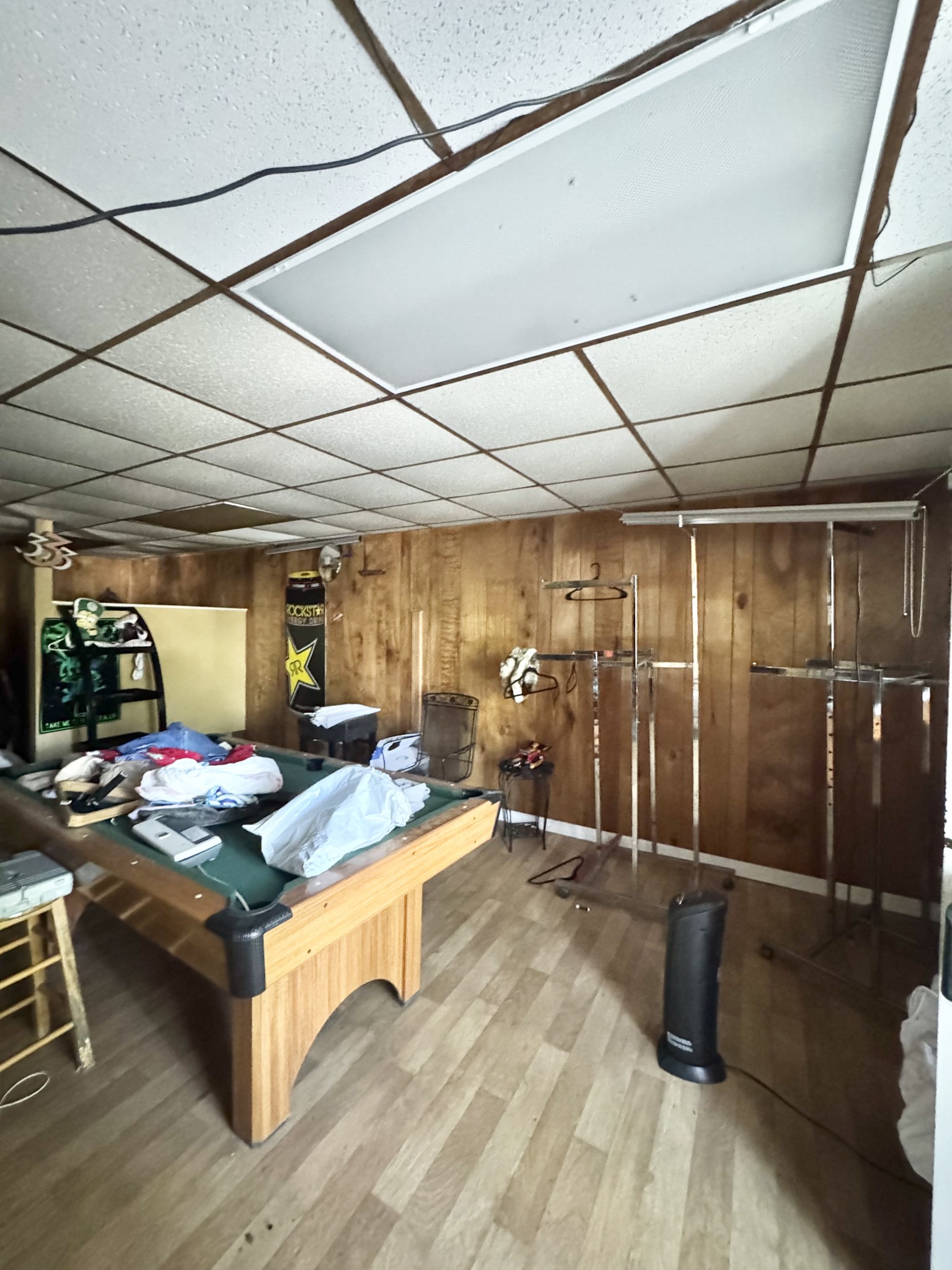 204 Bogle Street Dalton, GA 30721 - Photo 14 of 25 a room with stainless steel appliances kitchen island granite countertop a sink and cabinets