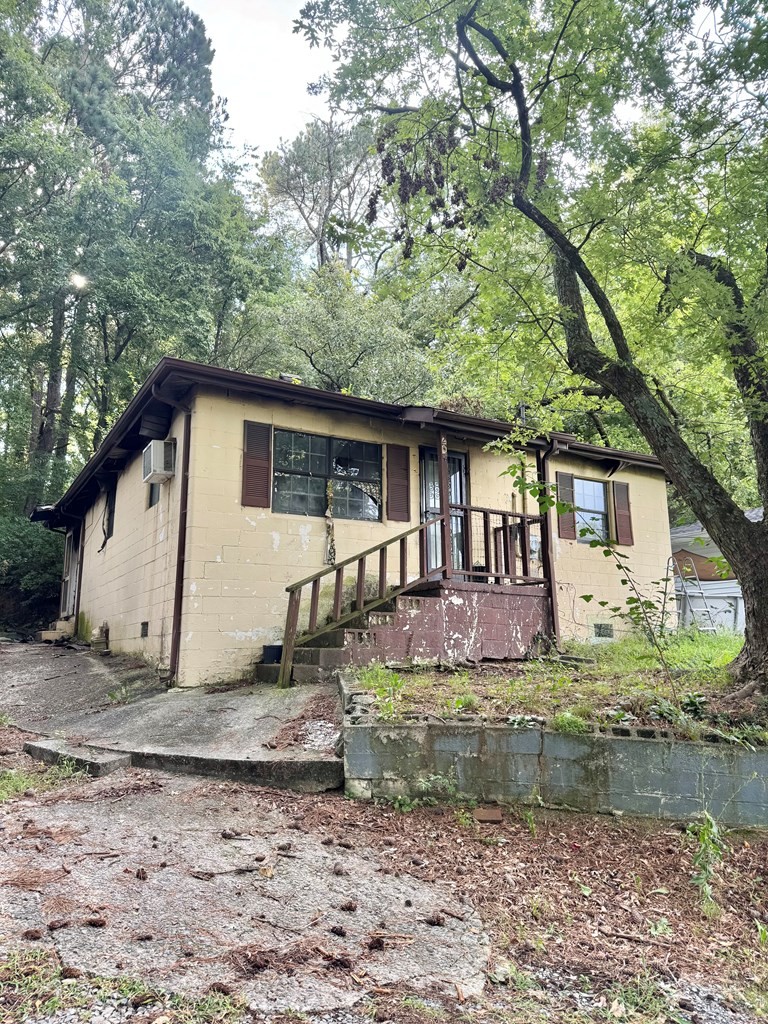 204 Bogle Street Dalton, GA 30721 - Photo 2 of 25 a house that has a tree in front of it