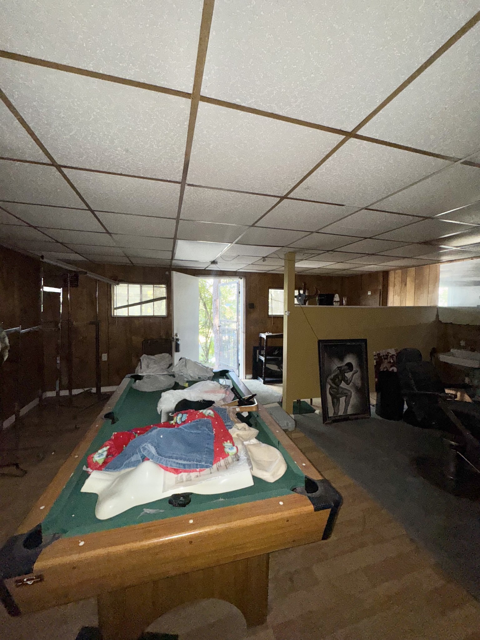 204 Bogle Street Dalton, GA 30721 - Photo 21 of 25 a room with gym equipment and a table