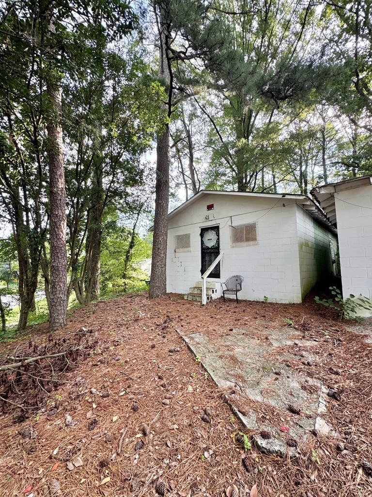 204 Bogle Street Dalton, GA 30721 - Photo 9 of 25 a house with trees in the background