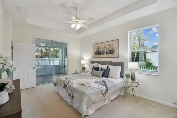 a bathroom with a bathtub sink and mirror