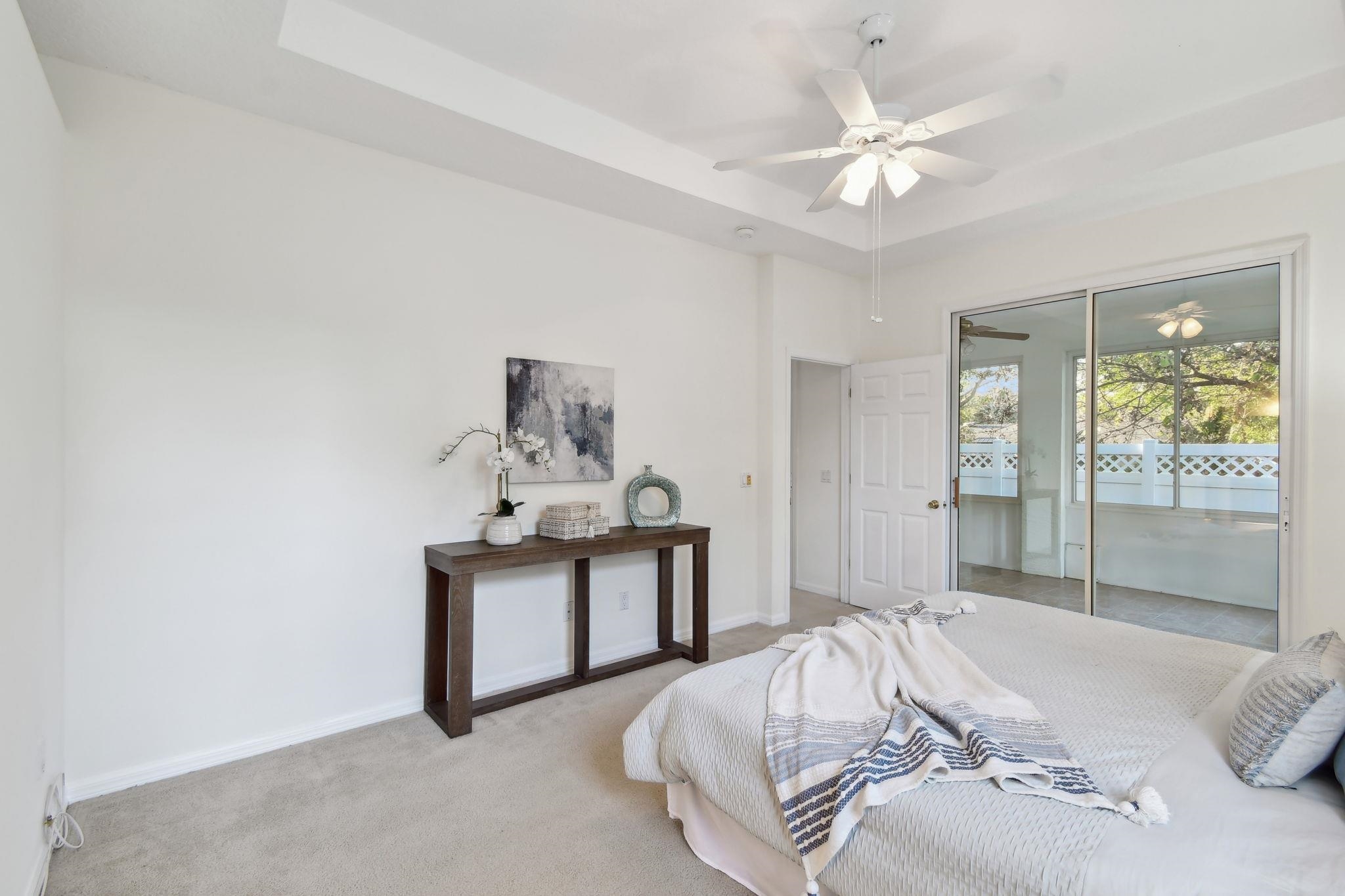581 Boxwood Place St. Augustine, FL 32086 - Photo 20 of 44 a bedroom with a bed and window