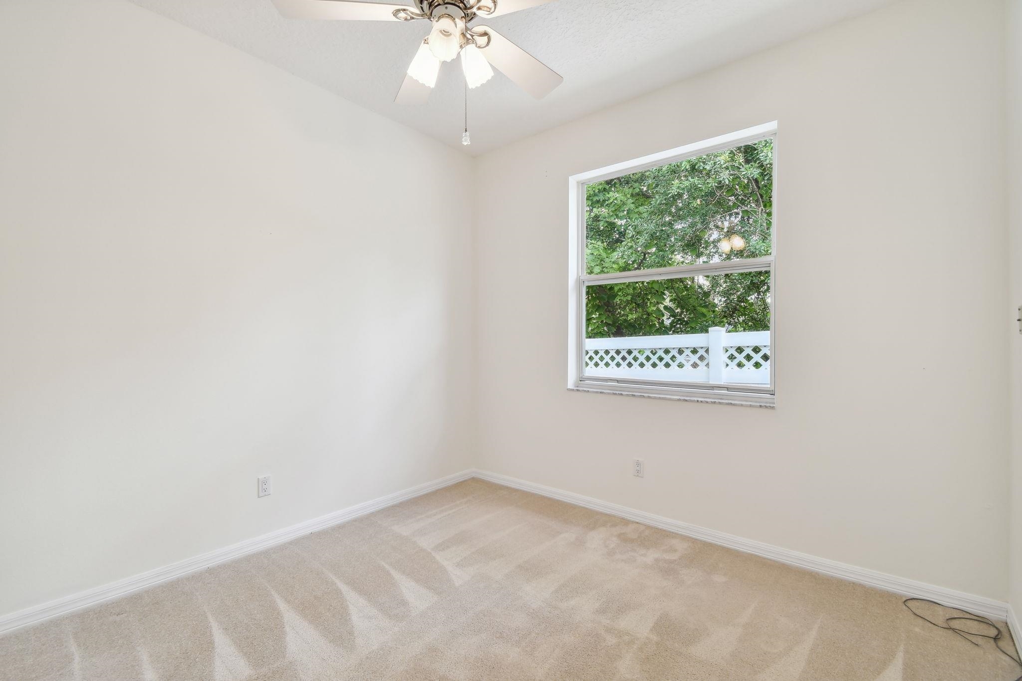 581 Boxwood Place St. Augustine, FL 32086 - Photo 27 of 44 an empty room with a window
