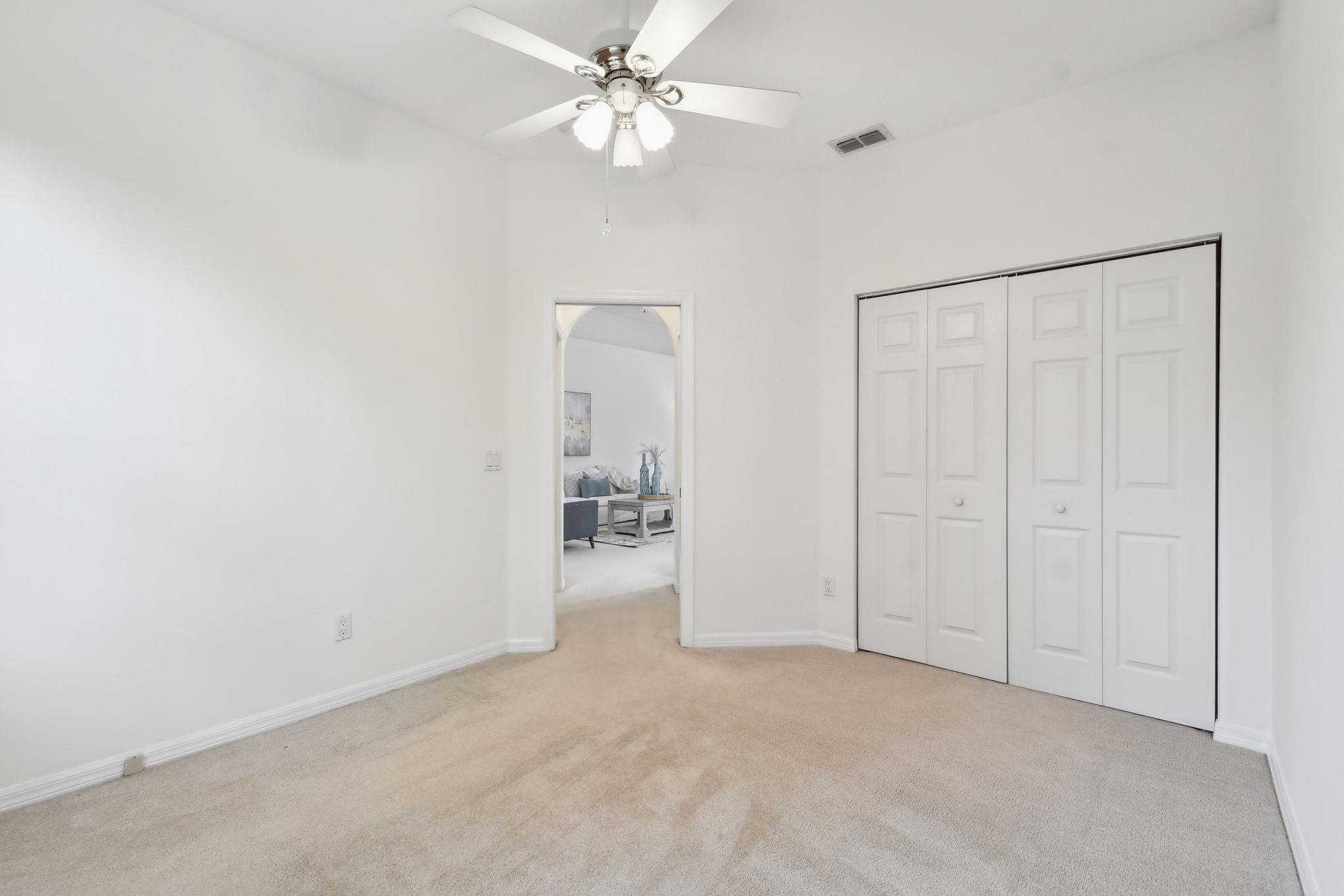 581 Boxwood Place St. Augustine, FL 32086 - Photo 28 of 44 a view of a livingroom with a ceiling fan and entryway