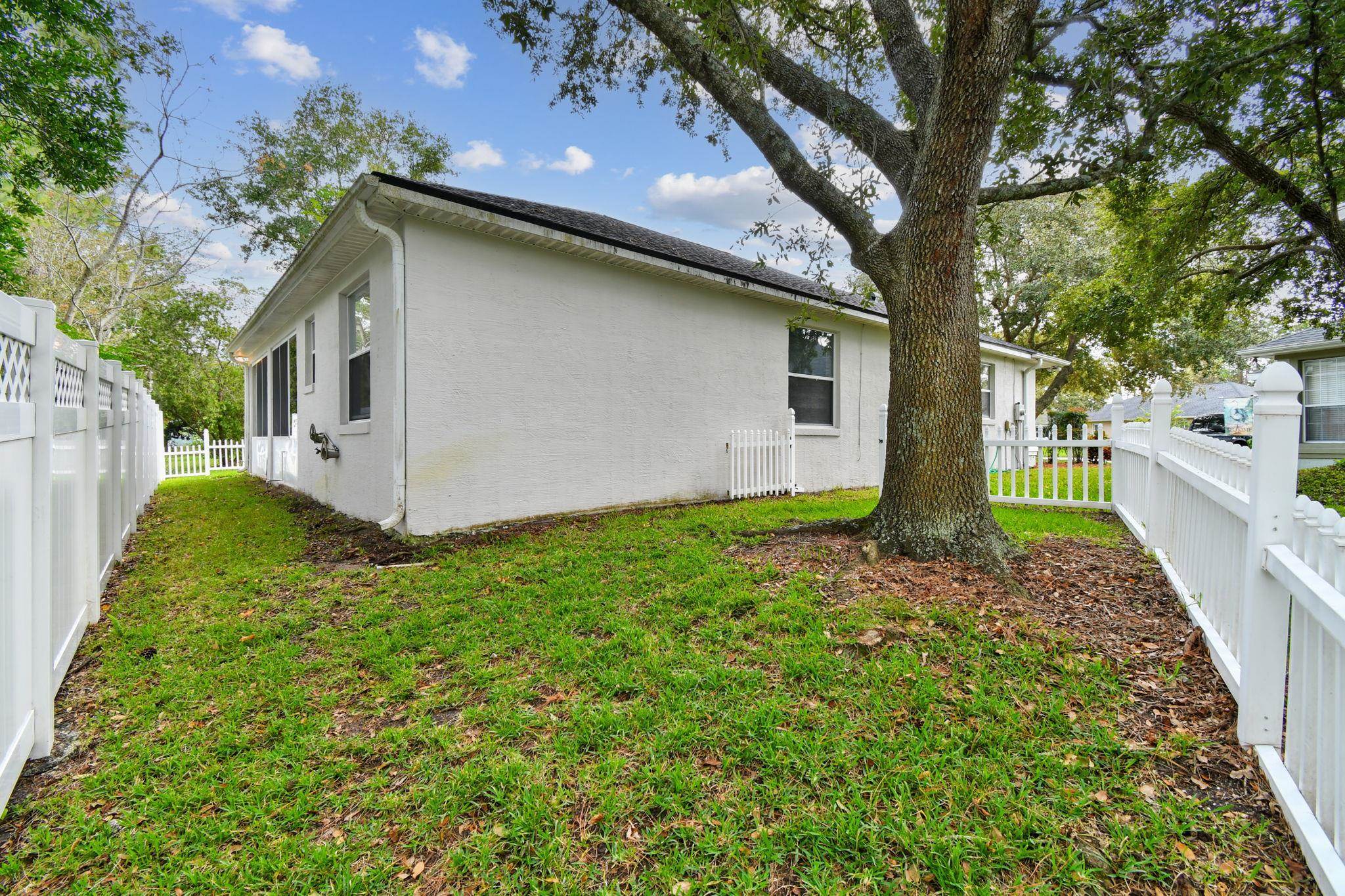 581 Boxwood Place St. Augustine, FL 32086 - Photo 36 of 44 a house view with a backyard space