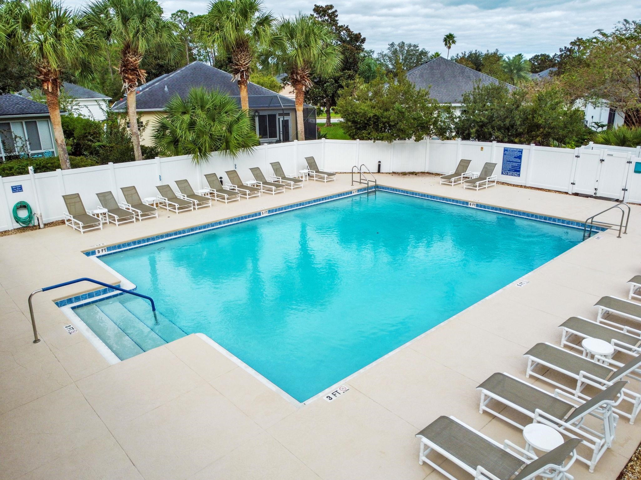 581 Boxwood Place St. Augustine, FL 32086 - Photo 41 of 44 a view of a swimming pool with a patio