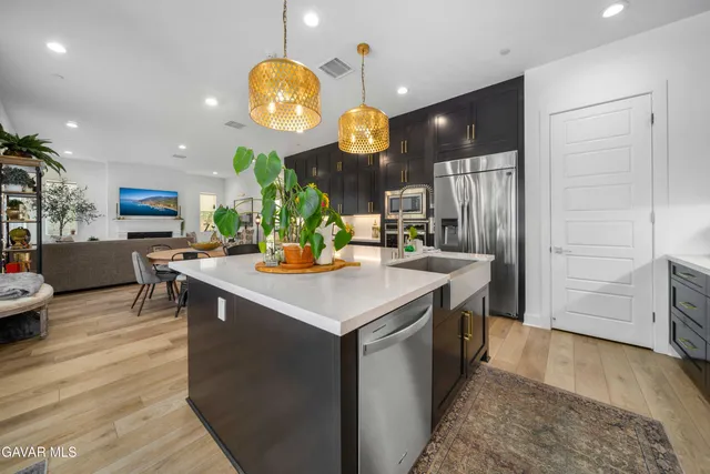 a bedroom with a bed and a table