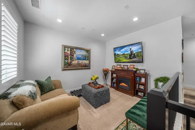 a white toilet sitting next to a bath tub
