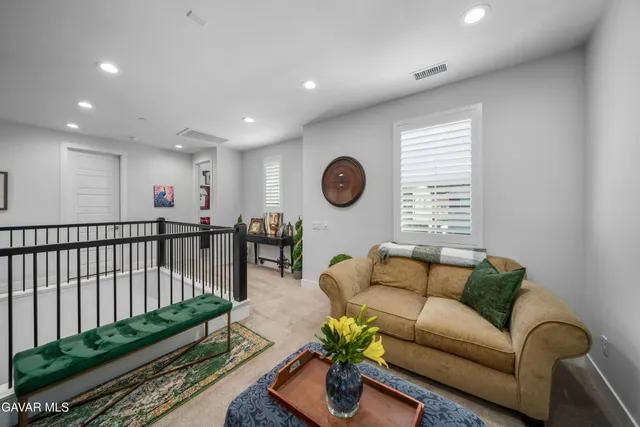 a bedroom with a bed and dresser