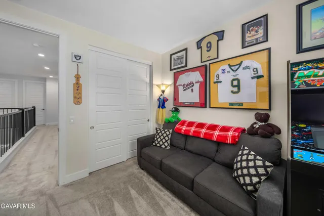 a bathroom with a granite countertop sink toilet a mirror and shower