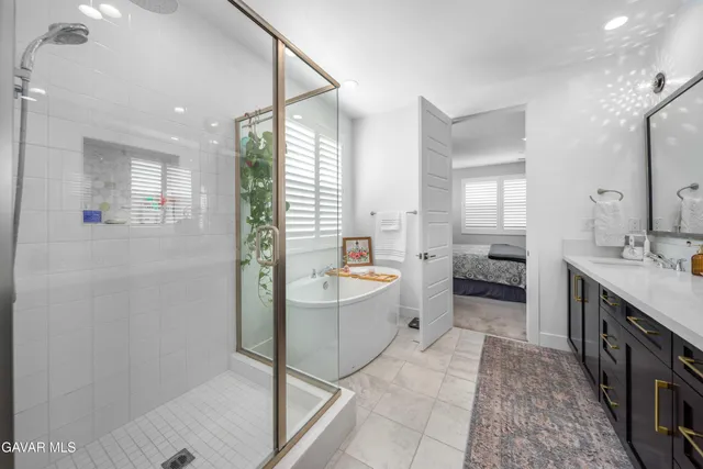 a view of a house with backyard sitting area and garden