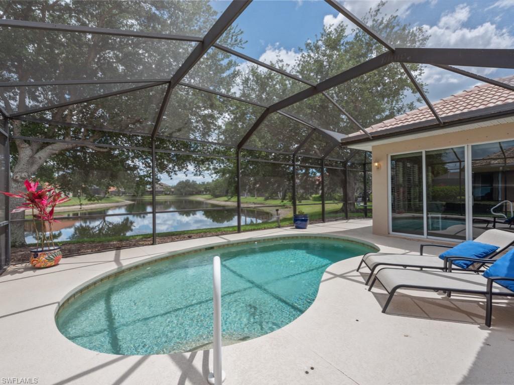 6840 Bent Grass Drive Naples, FL 34113 - Photo 18 of 21 a swimming pool with outdoor seating yard and outdoor seating