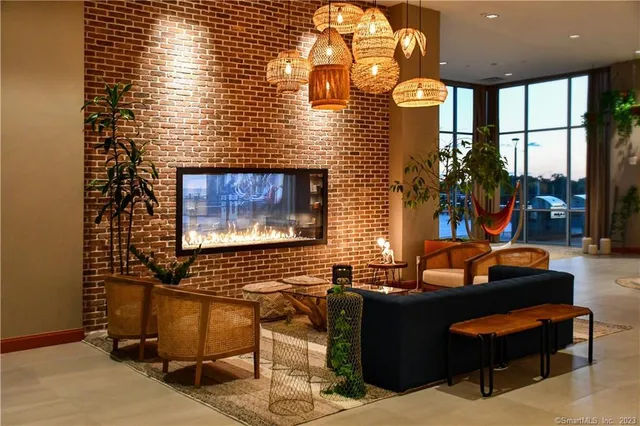 a outdoor living space with patio furniture and potted plants