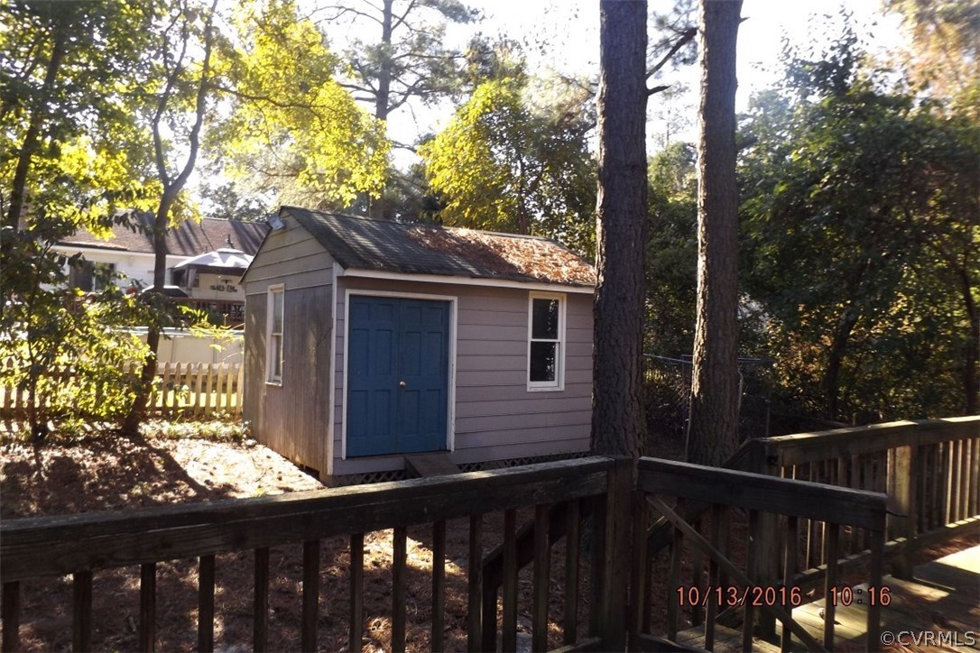 11101 Timonium Drive Chester, VA 23831 - Photo 11 of 18 a view of a house with a wooden deck