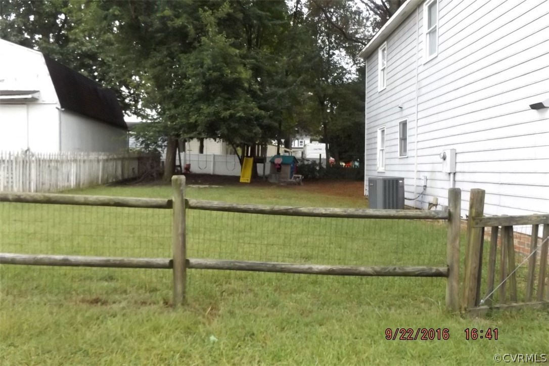 11101 Timonium Drive Chester, VA 23831 - Photo 14 of 18 a view of a backyard