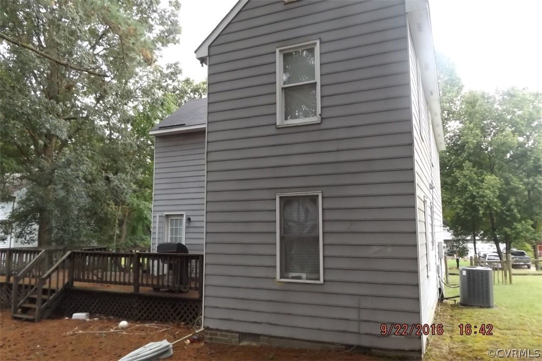 11101 Timonium Drive Chester, VA 23831 - Photo 17 of 18 a view of a house with a patio