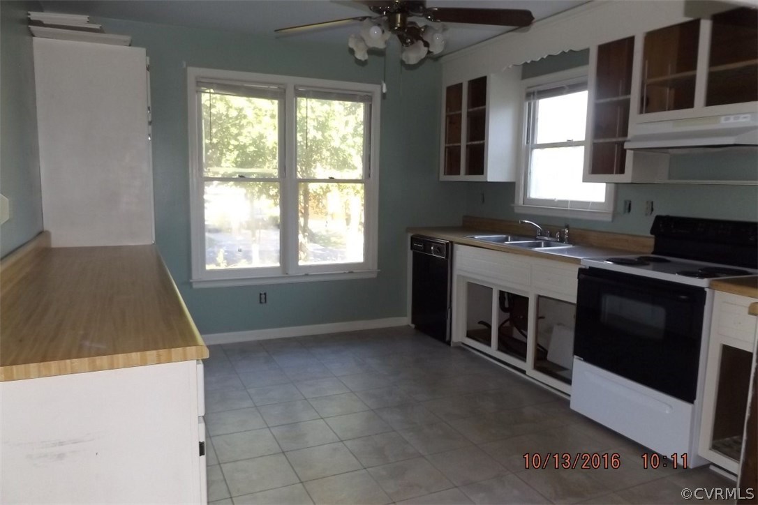 11101 Timonium Drive Chester, VA 23831 - Photo 3 of 18 a kitchen that has a stove and a microwave