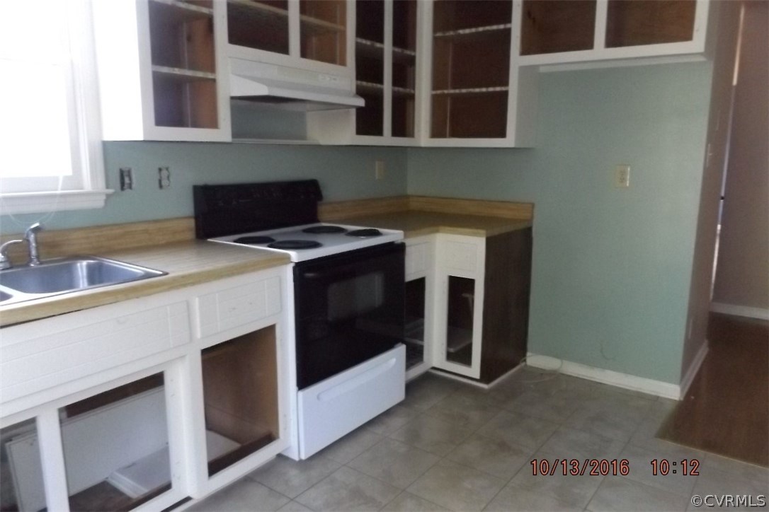 11101 Timonium Drive Chester, VA 23831 - Photo 4 of 18 a kitchen with a stove and a sink