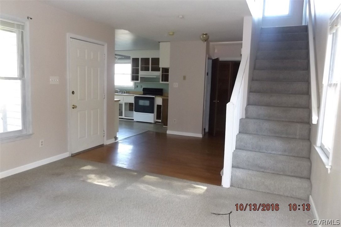 11101 Timonium Drive Chester, VA 23831 - Photo 6 of 18 a view of a kitchen from the hallway