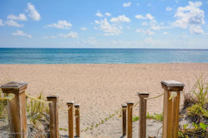 2780 South Ocean Boulevard, Unit 312 Palm Beach, FL 33480 - Photo 1 of 29 a view of a lake with a yard