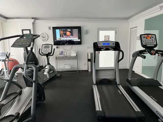 a view of a room with gym equipment