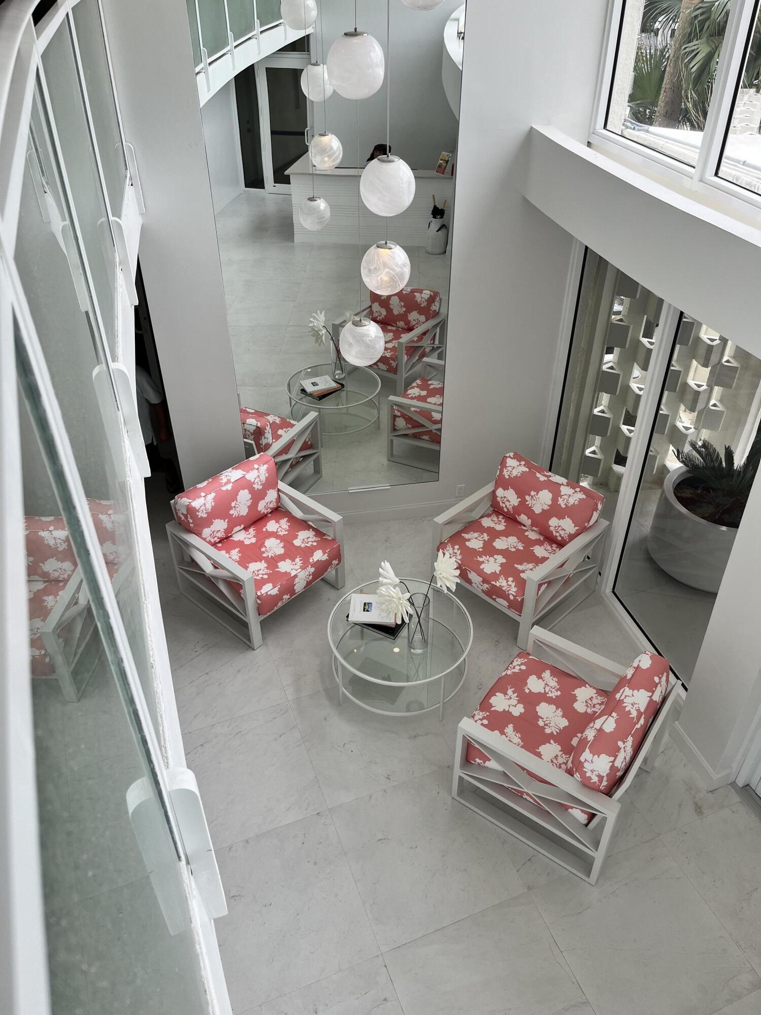 2780 South Ocean Boulevard, Unit 312 Palm Beach, FL 33480 - Photo 21 of 29 a living room with furniture and rug floor